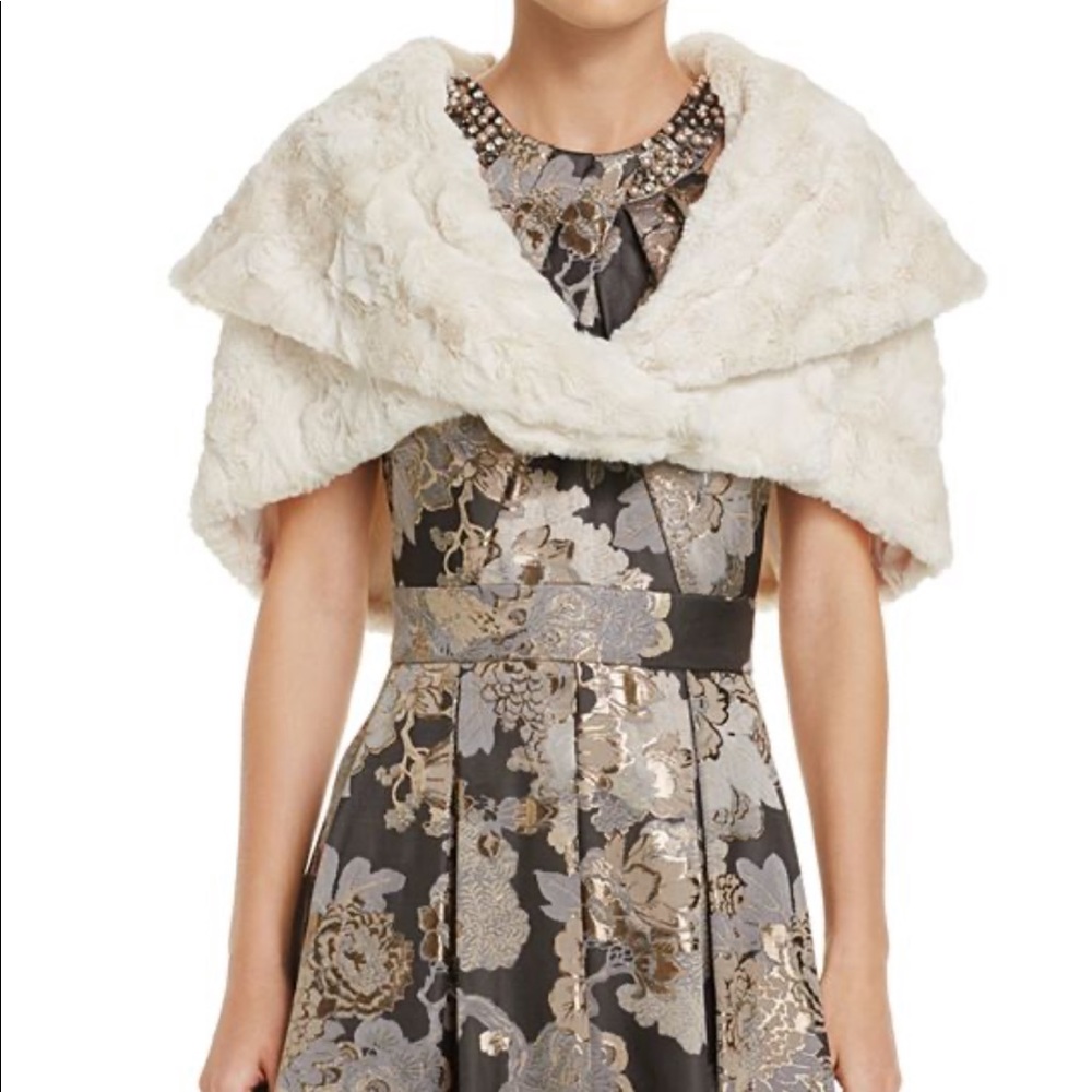 Faux fur capelet NWT in cream